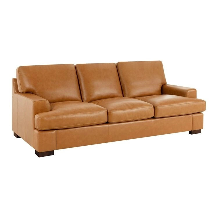 Canapé moderne en cuir véritable avec pieds en bois et coussin traversin supplémentaire